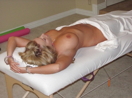 Blond mom Heather Summers shows off nice tits after disrobing on massage table 47095472
